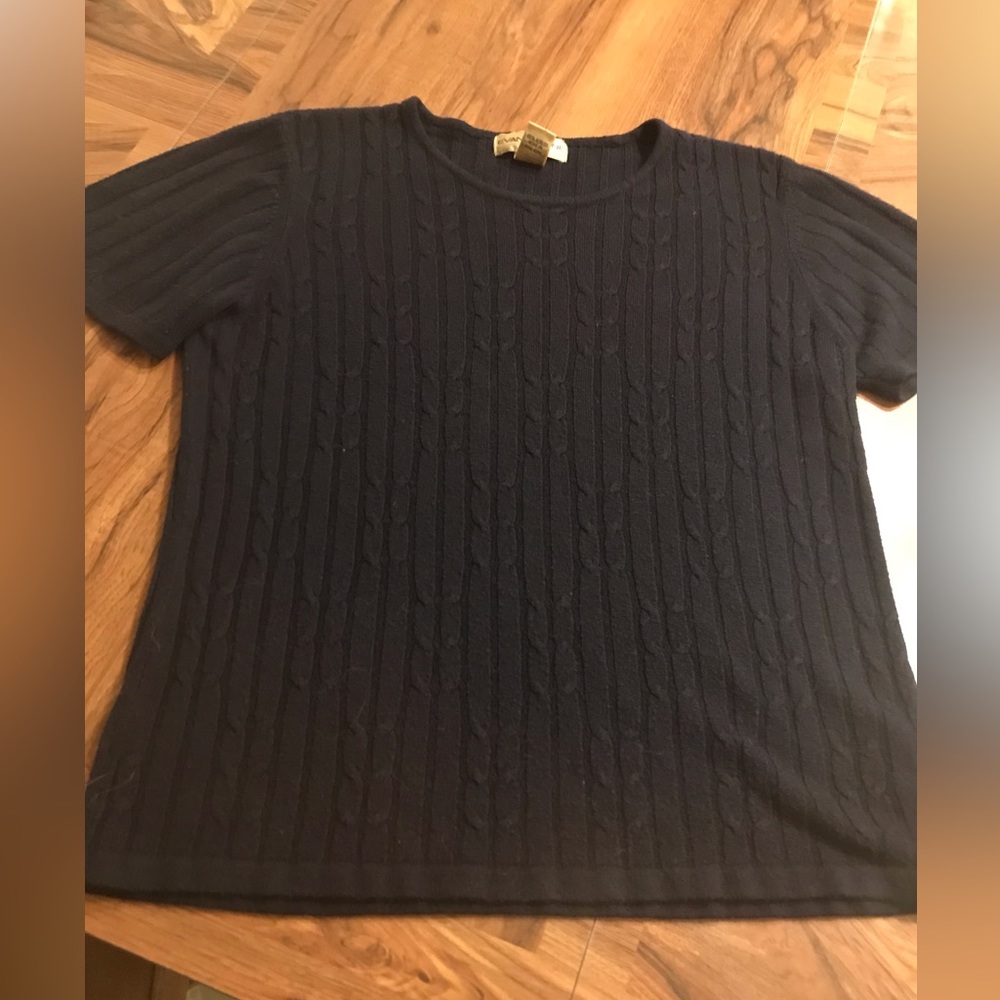Women’s Black Shirt./Sweater material.